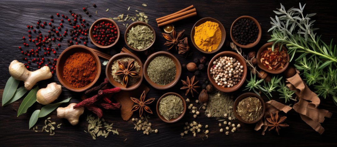 assortment of adaptogenic herbs and spices on a table