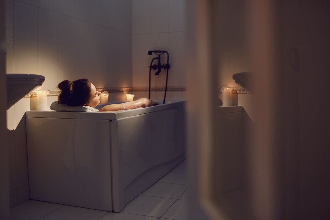 Woman relaxing in the bathtub