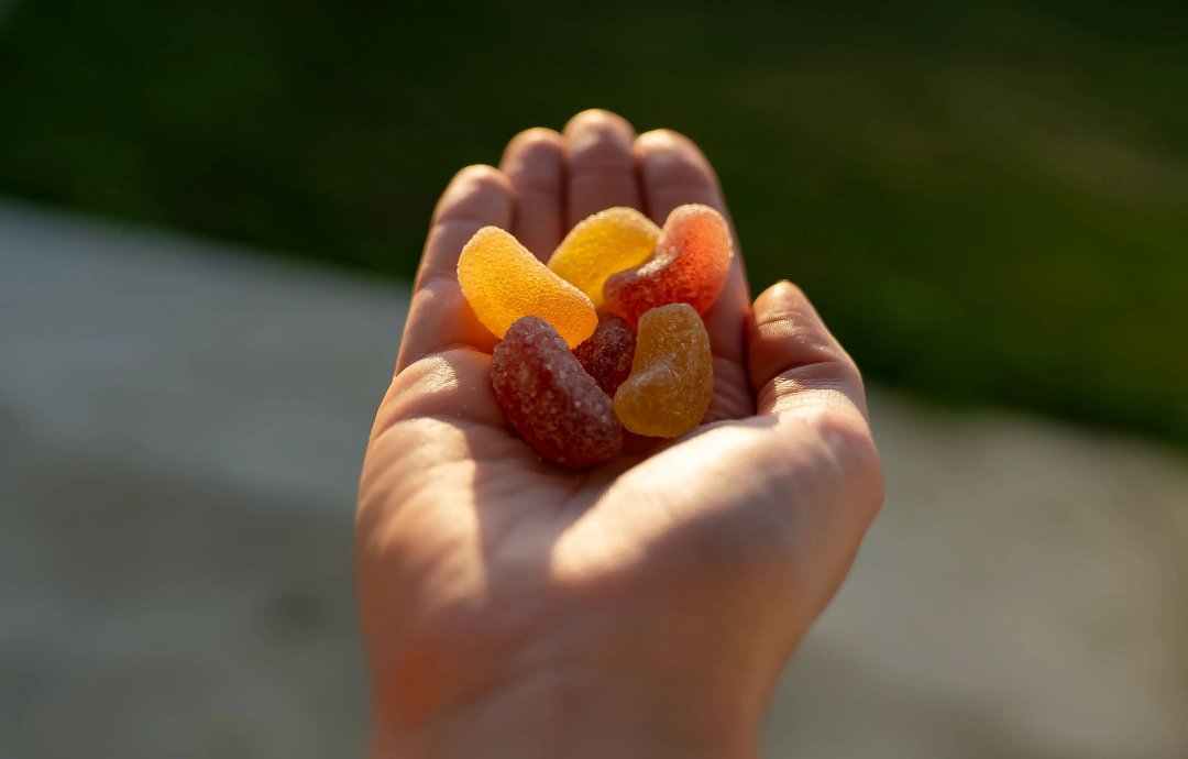 hand holding some cbd edibles