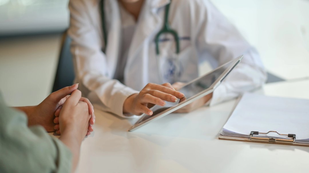 doctor and patient consultation in medical office