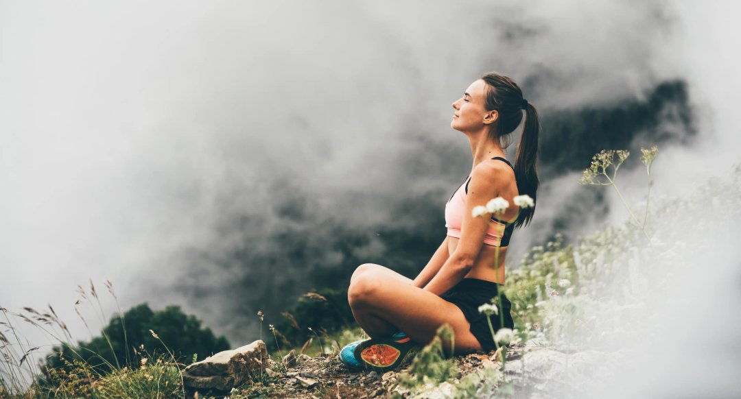 woman enjoying meditation outside