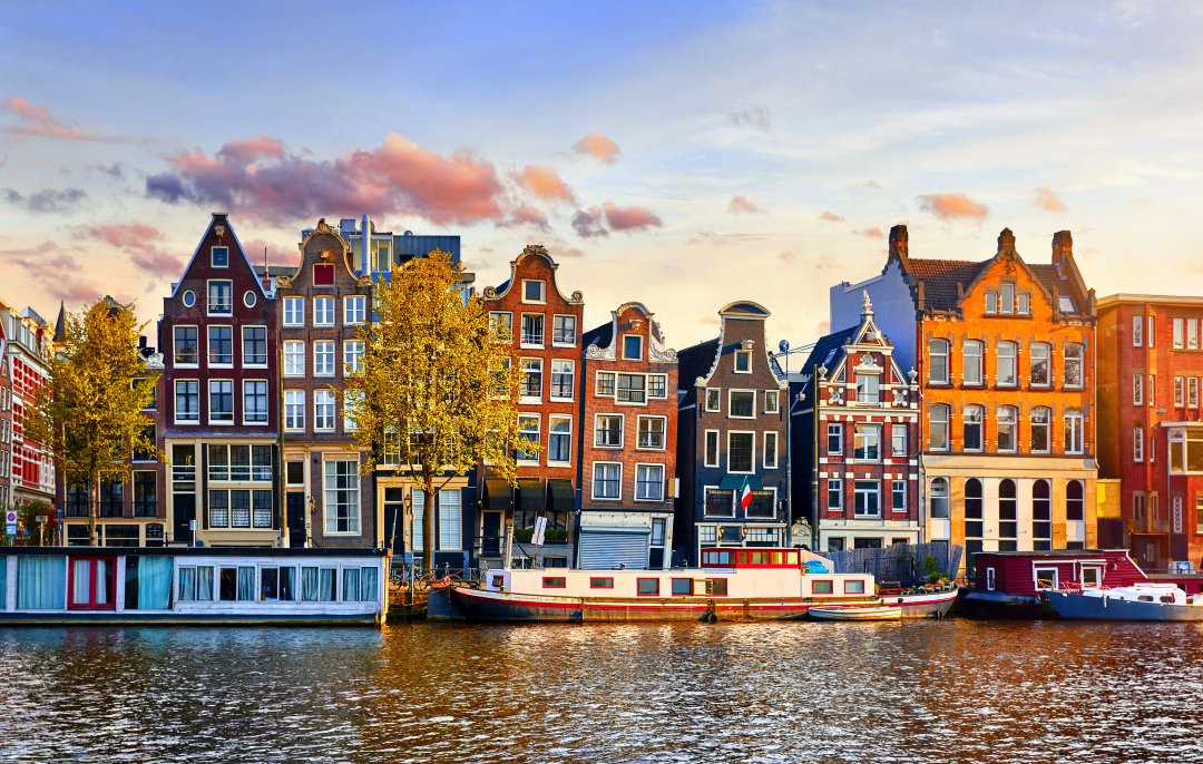 amsterdam netherlands lanscape with buildings and boat