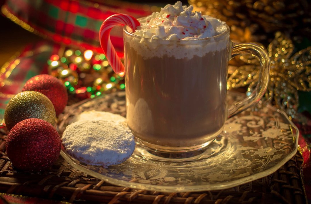 peppermint mocha surrounded by christmas decorations