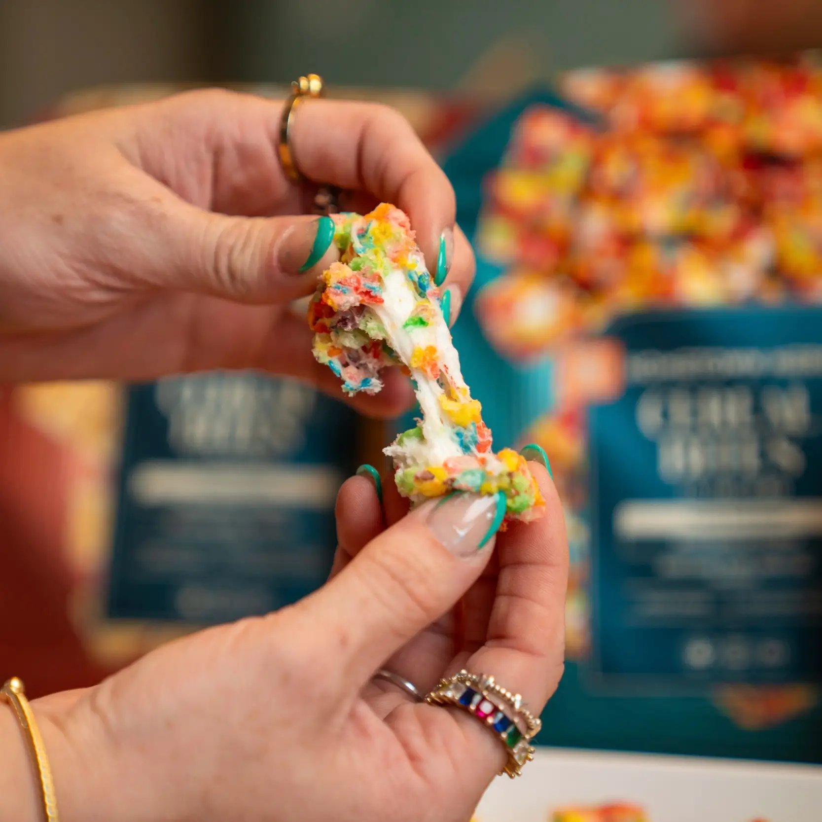 pulling apart a rainbow crispy edible