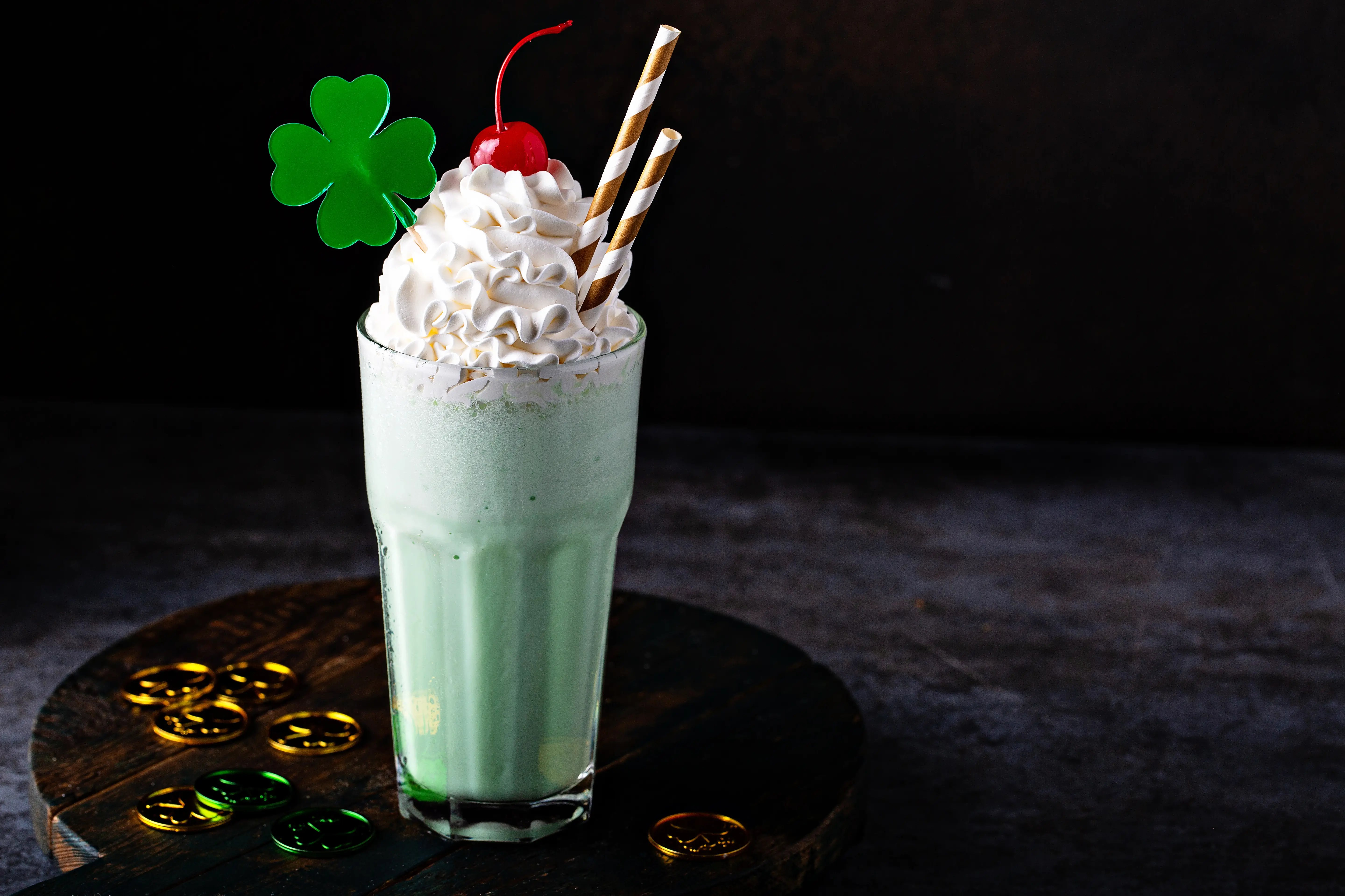 a glass filled with a thc-infused minty milkshake